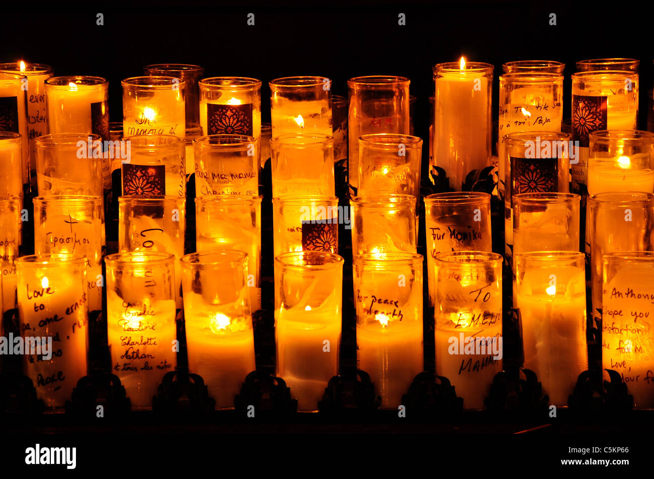 Votive candles burning in church Stock Photo Alamy