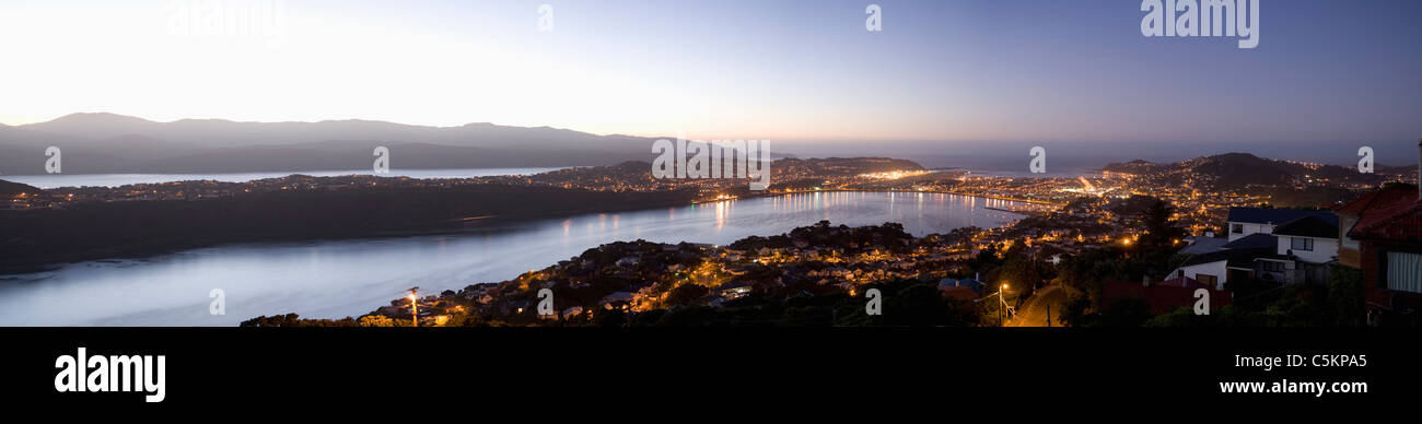 Panorama from Mount Victoria of Wellington Airport, Cook Strait and Evans Bay at dawn, Wellington, New Zealand Stock Photo