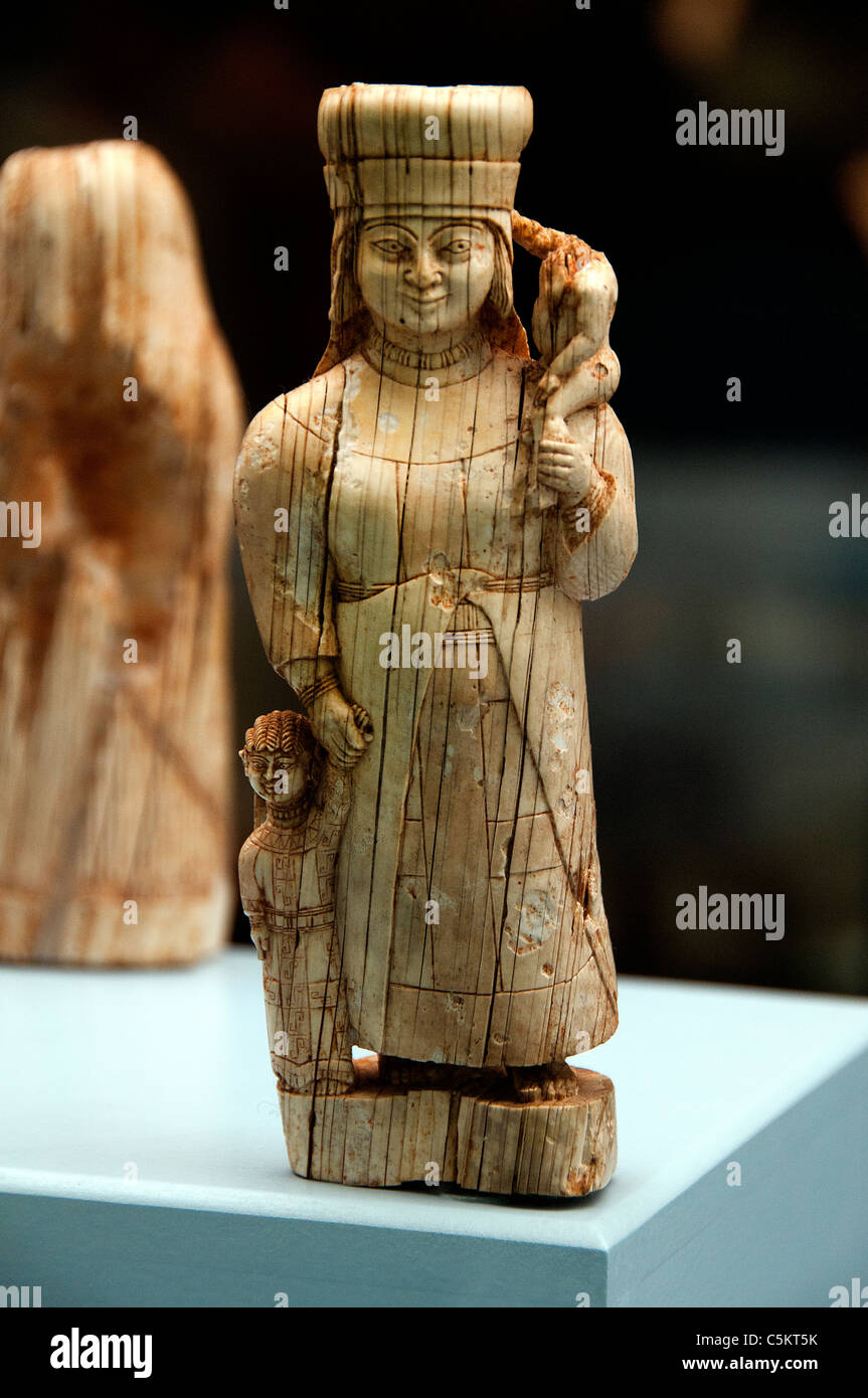 Female Goddess Kybele or Leto with two children Ivory statuette 7 - 6 th Cent BC Bayindir Elmali Turkey  Phrygian Anatolia Stock Photo