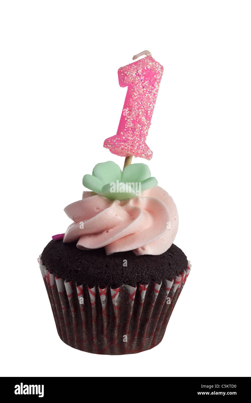 Mini cupcake with birthday candle for one year old isolated on white