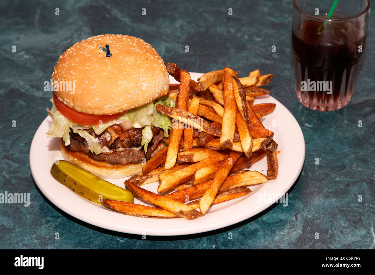 large double half pound burger fries and cola Stock Photo