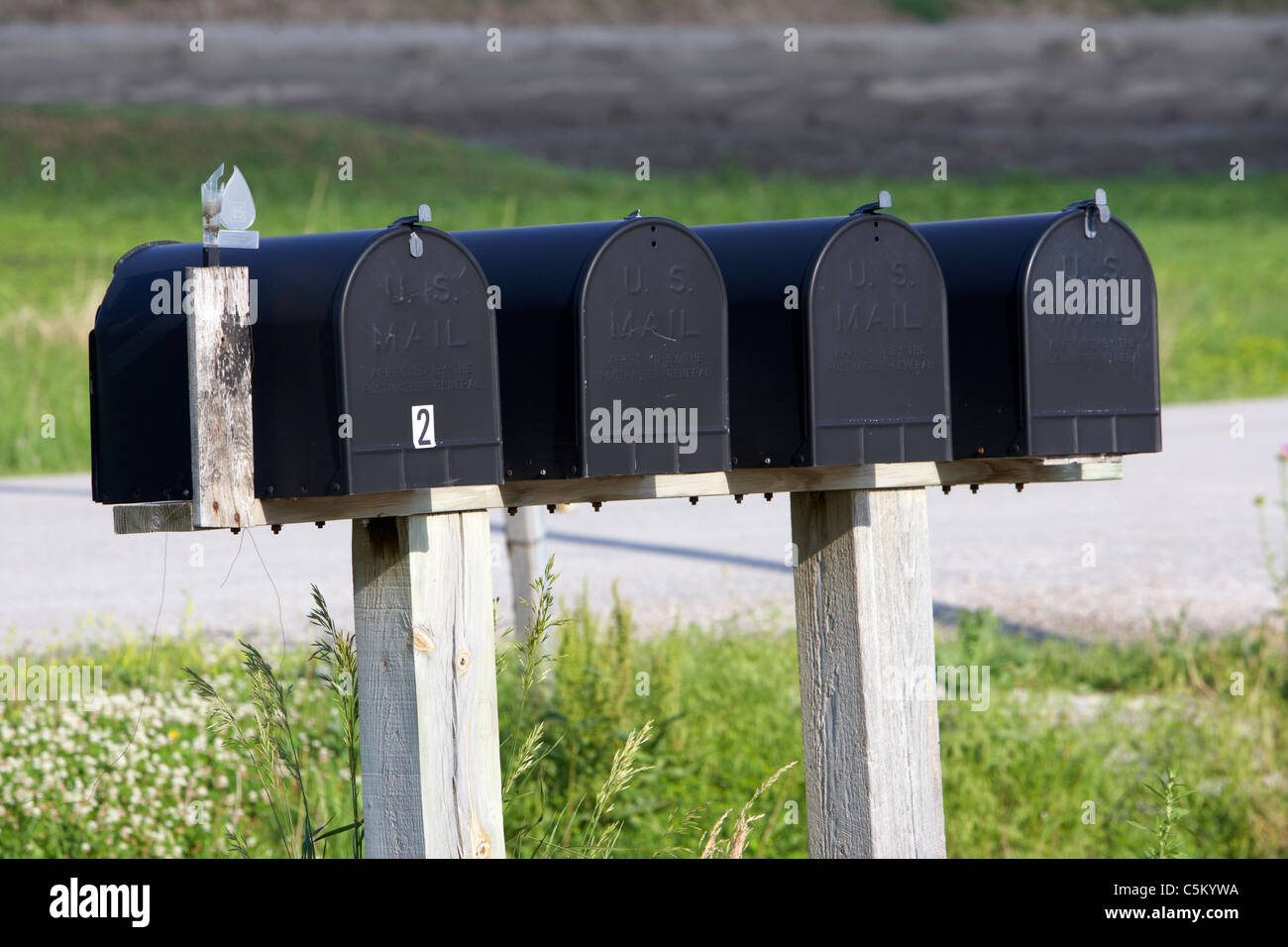 row of black us mail mailboxes in iowa united states of america Stock Photo