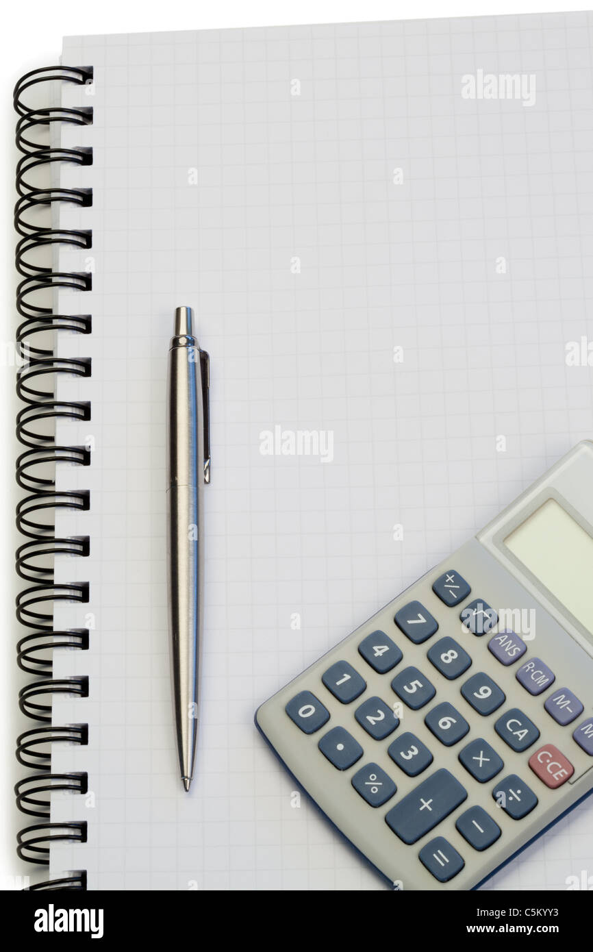Notebook with pen and pocket calculator Stock Photo Alamy
