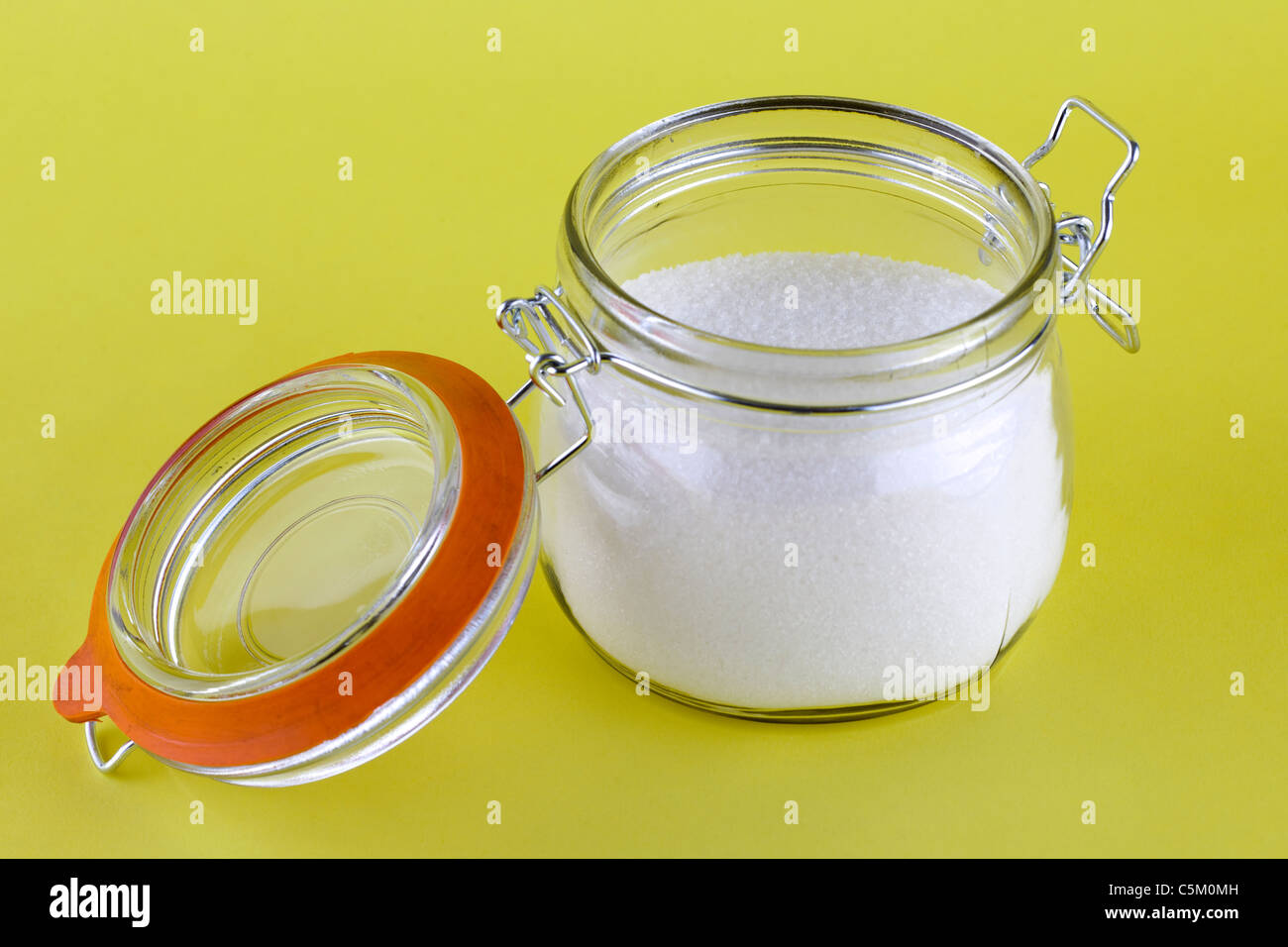 Rubber sealed  clip glass container full of sugar Stock Photo