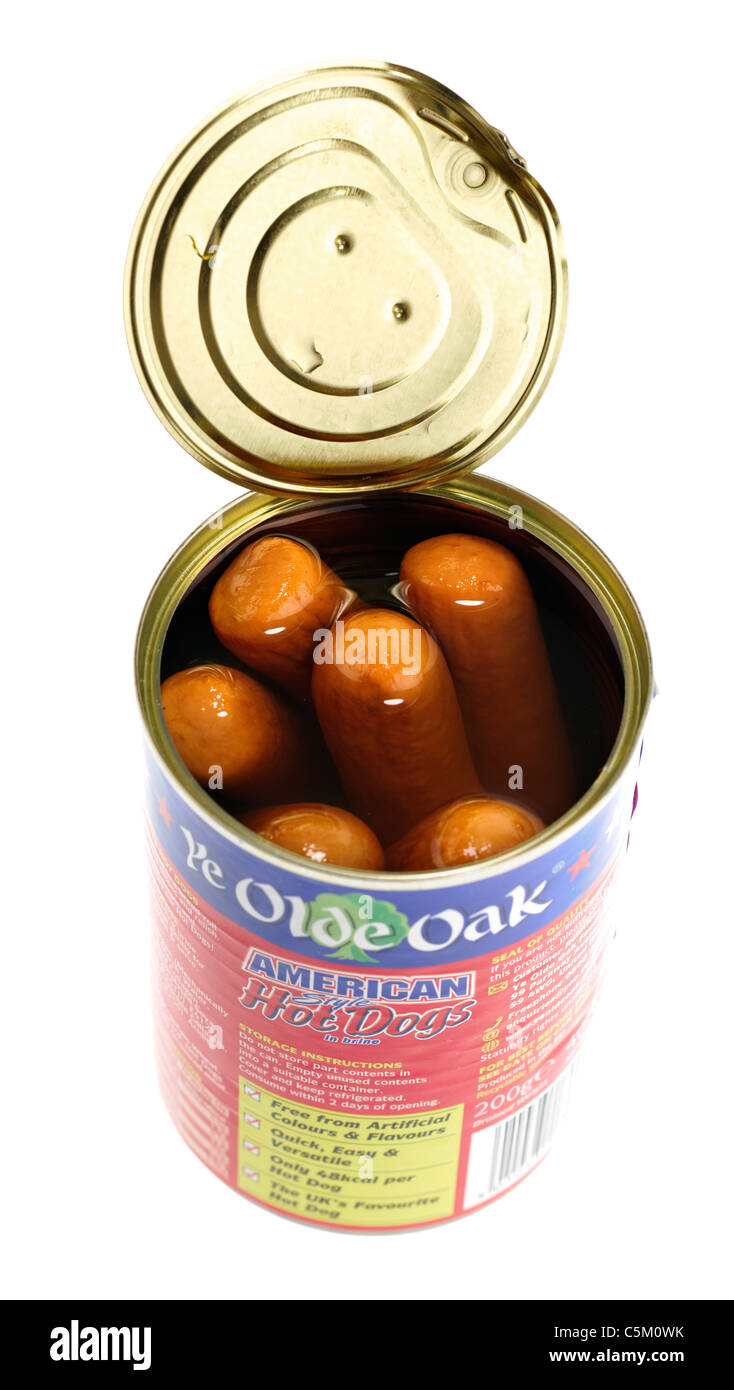 Opened can of six American style hot dogs in brine. Stock Photo