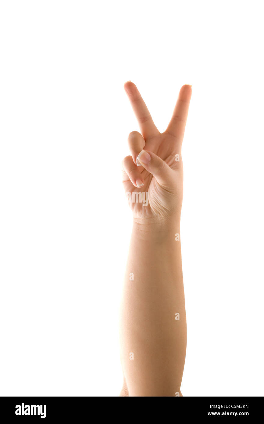 A hand holding up the peace sign or number two with two fingers isolated over white. Stock Photo