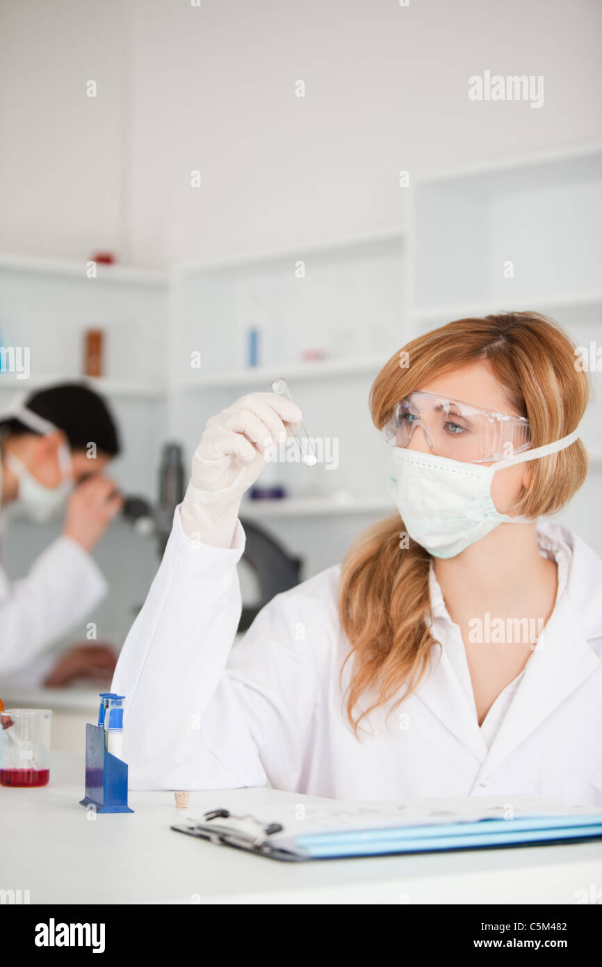 Scientists carrying out an experiment Stock Photo