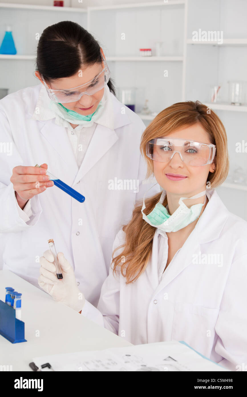 Female scientists with safety glasses Stock Photo