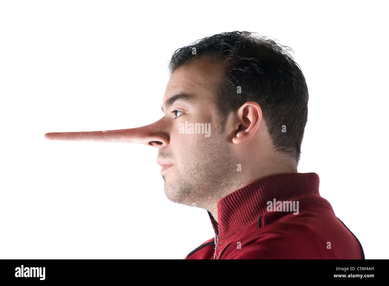 A dishonest man has a nose that grew long when he lied just like in the story of Pinocchio. Stock Photo