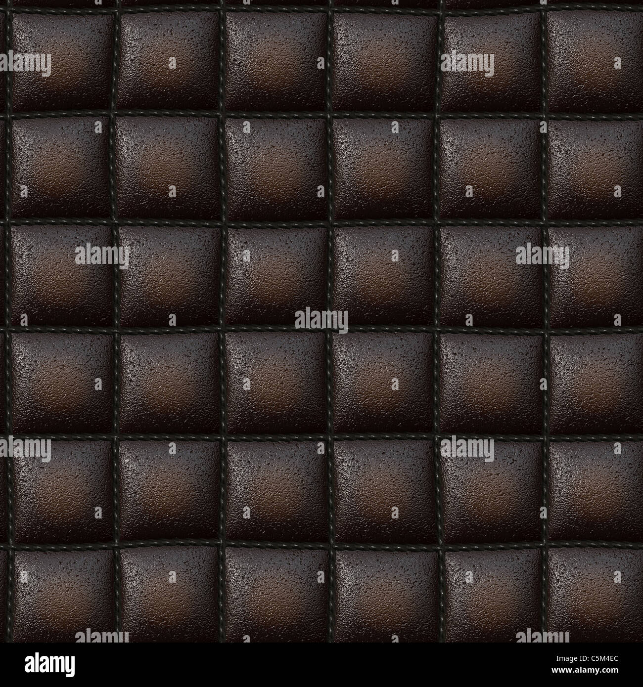 Dark brown leather padded leather or vinyl upholstery texture that tiles seamlessly as a pattern. Stock Photo