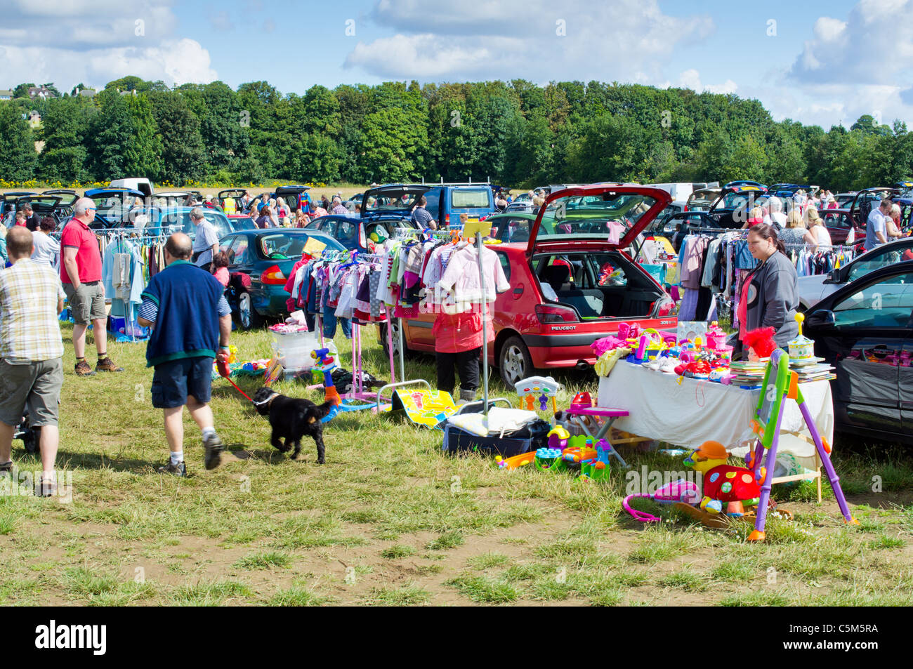 Sellers and buyers at a car boot sale Stock Photo Alamy