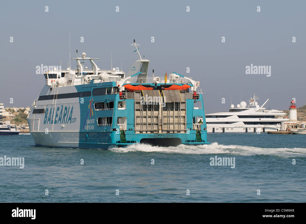 Fast Ferry the Nixe departing Eivissa Port on the Spanish Island of Ibiza and bound for Formentera Stock Photo