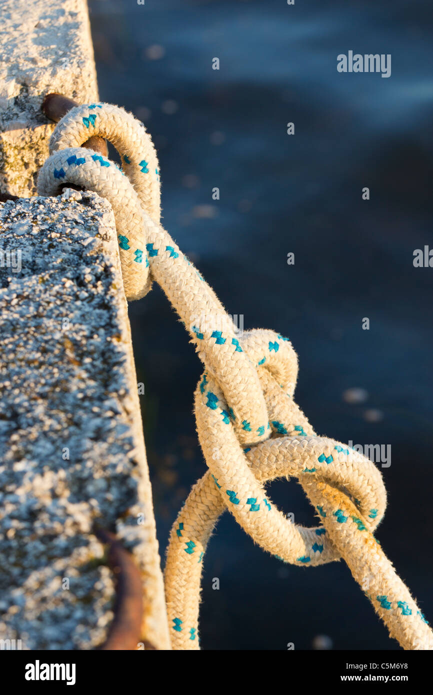 Knot on a fishermans boat rope Stock Photo