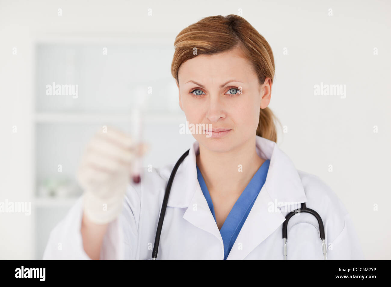 Blond-haired scientist looking at the camera Stock Photo