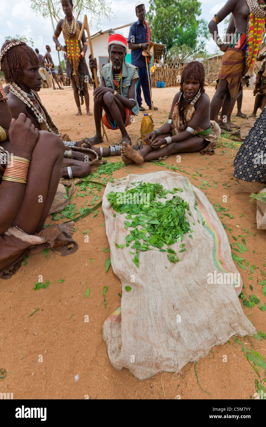 Tribespeople trading at a local market in the town of Turmi in the ...
