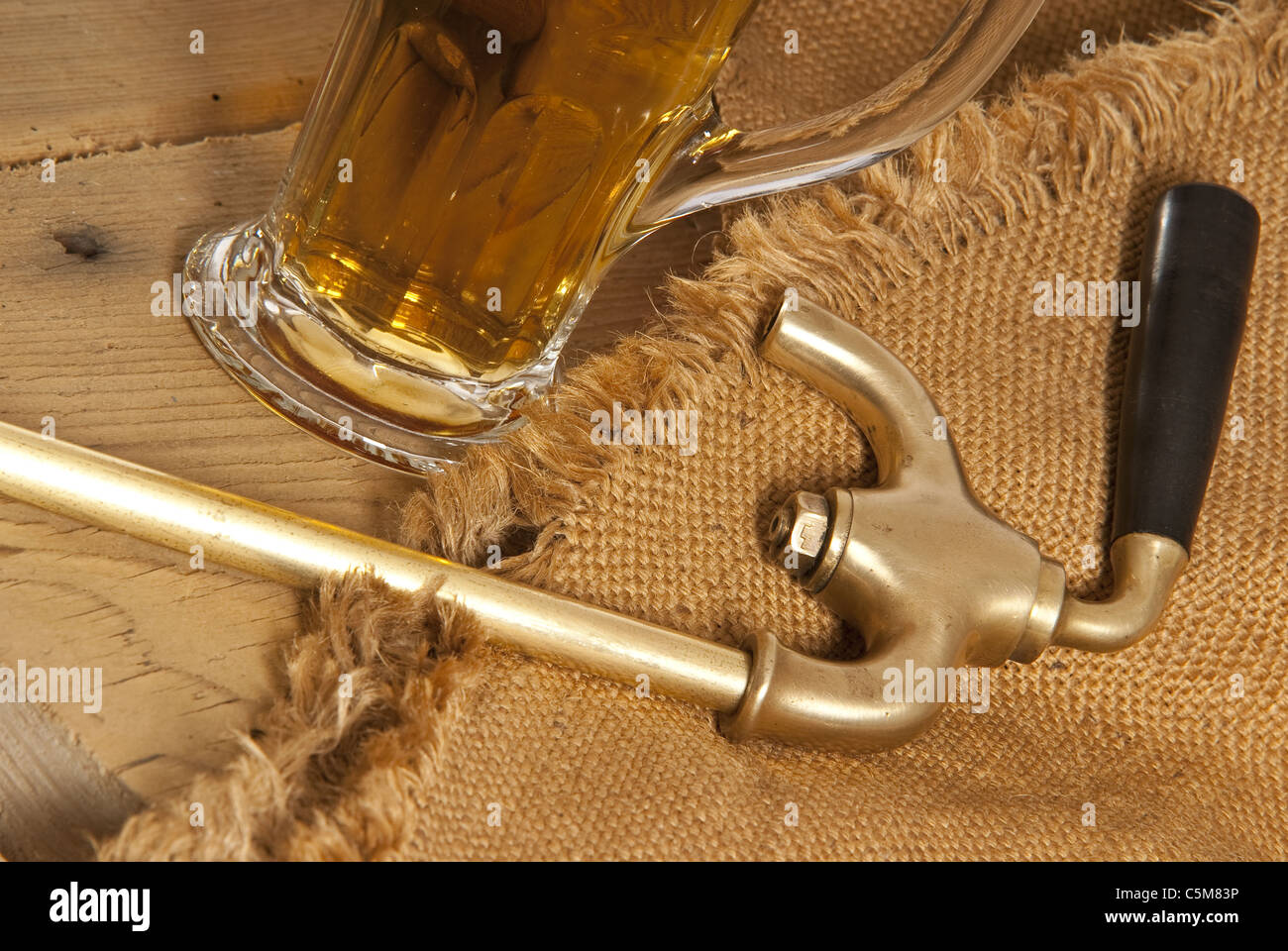 brass faucet with beer Stock Photo Alamy