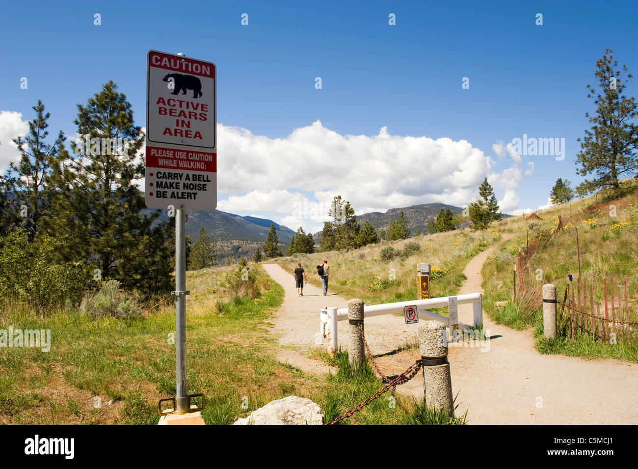 A bear warning sign by the footpaths above Okanagan Lake, Kelowna, Canada Stock Photo