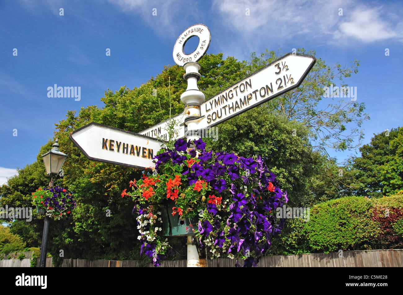 Antique signpost on The Green, Milford-on-Sea, Hampshire, England, United Kingdom Stock Photo