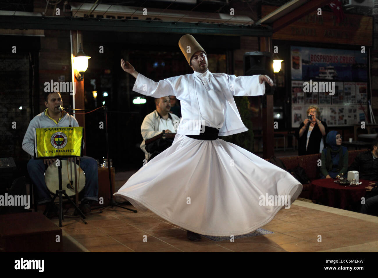 Whirling Dervish dancing  in Istanbul, Turkey Stock Photo