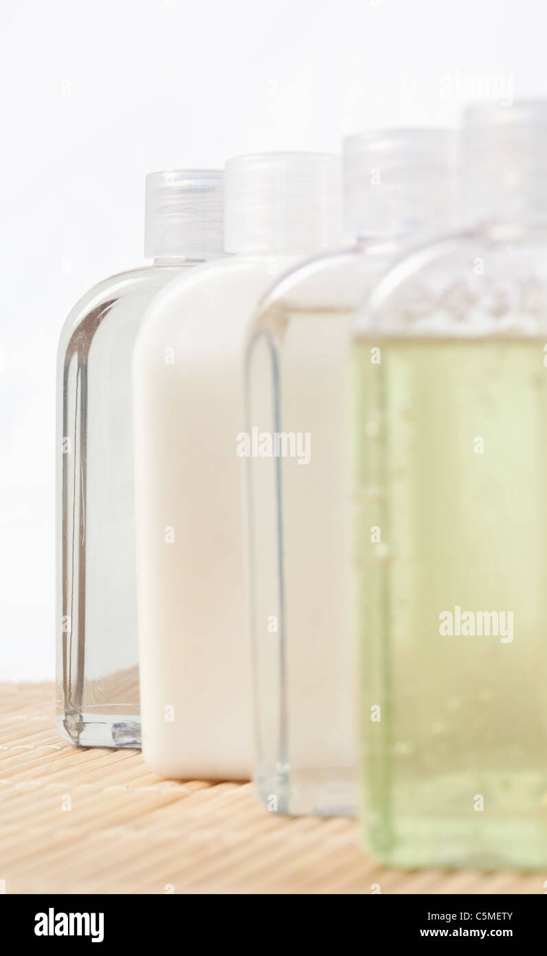 Close up of four massage oil bottles Stock Photo Alamy