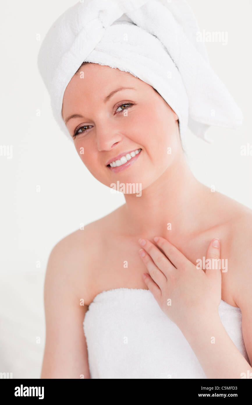 Gorgeous young woman wrapped in a towel Stock Photo - Alamy