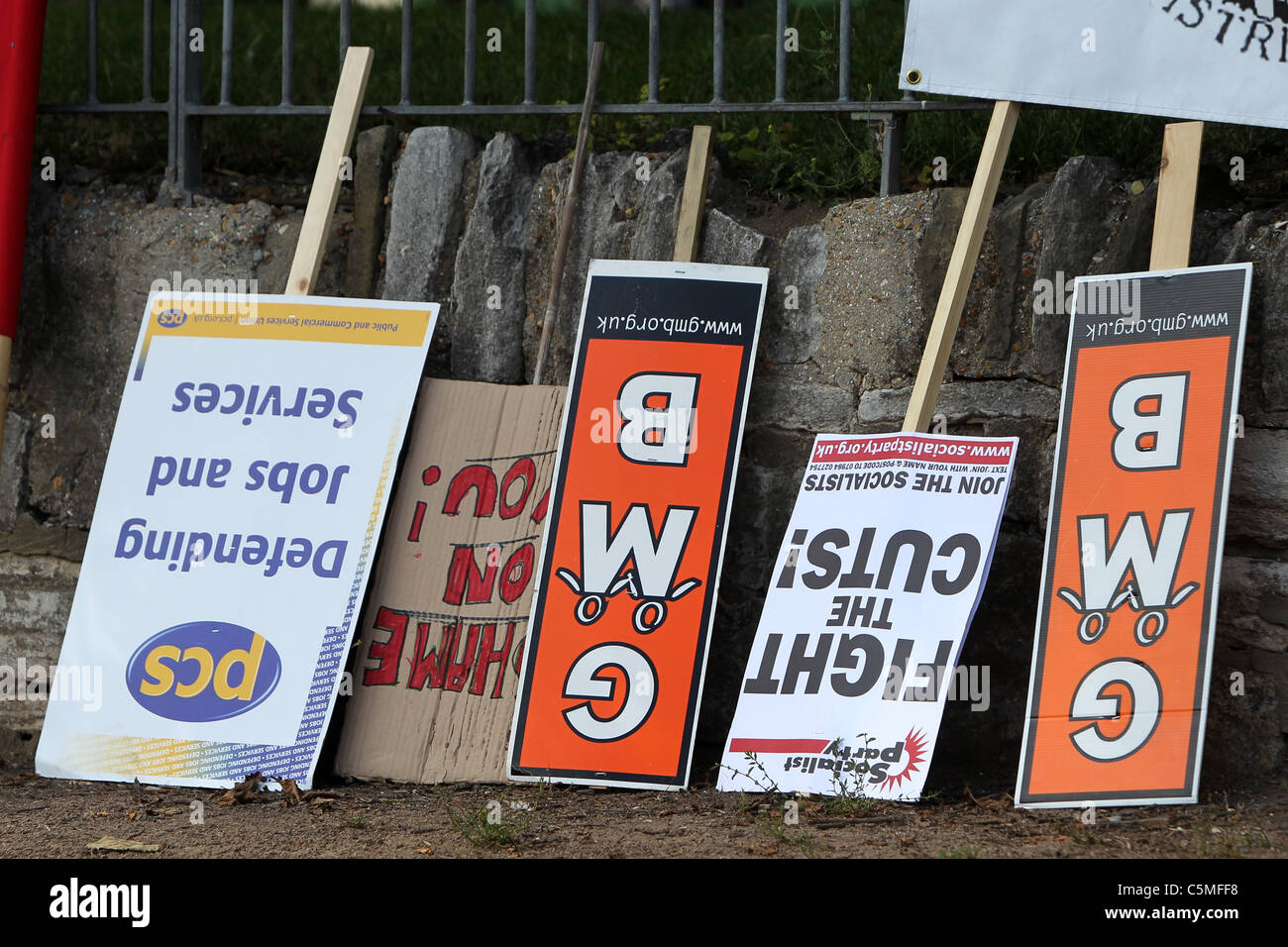Protest boards and placards waiting to be used at a protest on Government cuts in Brighton, East Sussex, UK. Stock Photo