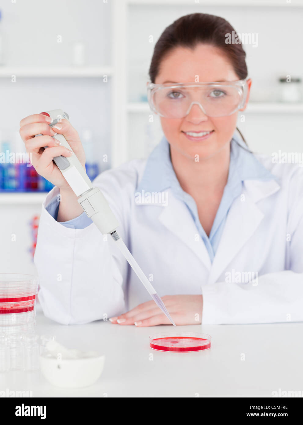 Portrait of a young scientist  preparing a sample Stock Photo