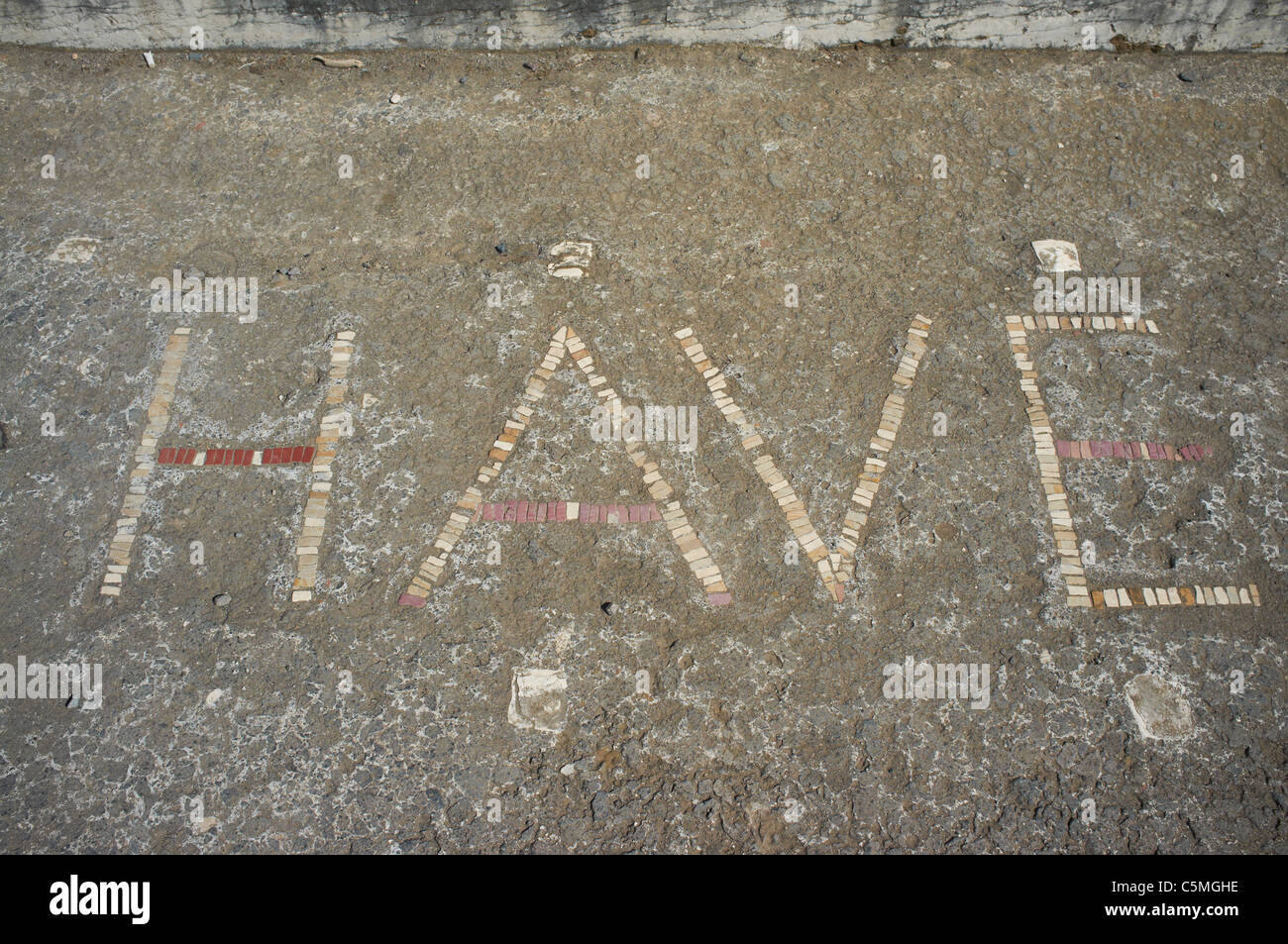 HAVE mosaic outside the house of the faun Pompeii Italy Stock Photo