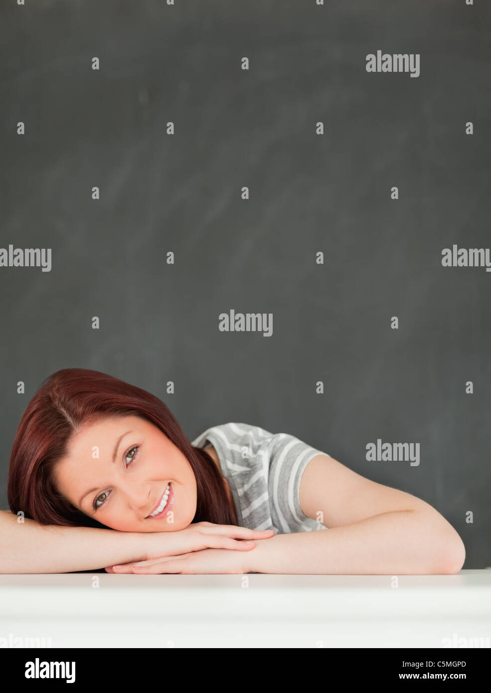 Portrait of a happy student in a classroom Stock Photo - Alamy