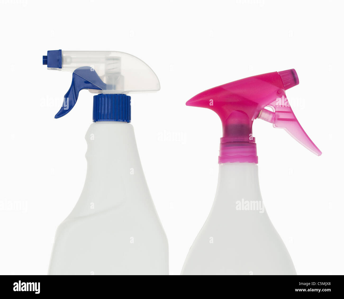 Close up of a pink and a blue spray bottles Stock Photo