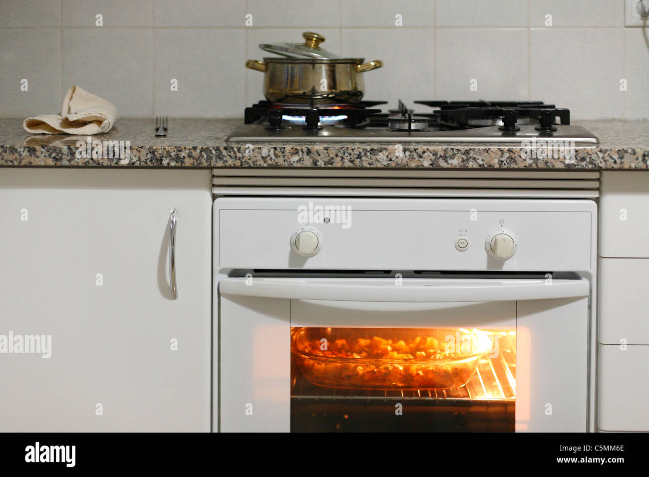 Food cooking in the oven Stock Photo Alamy