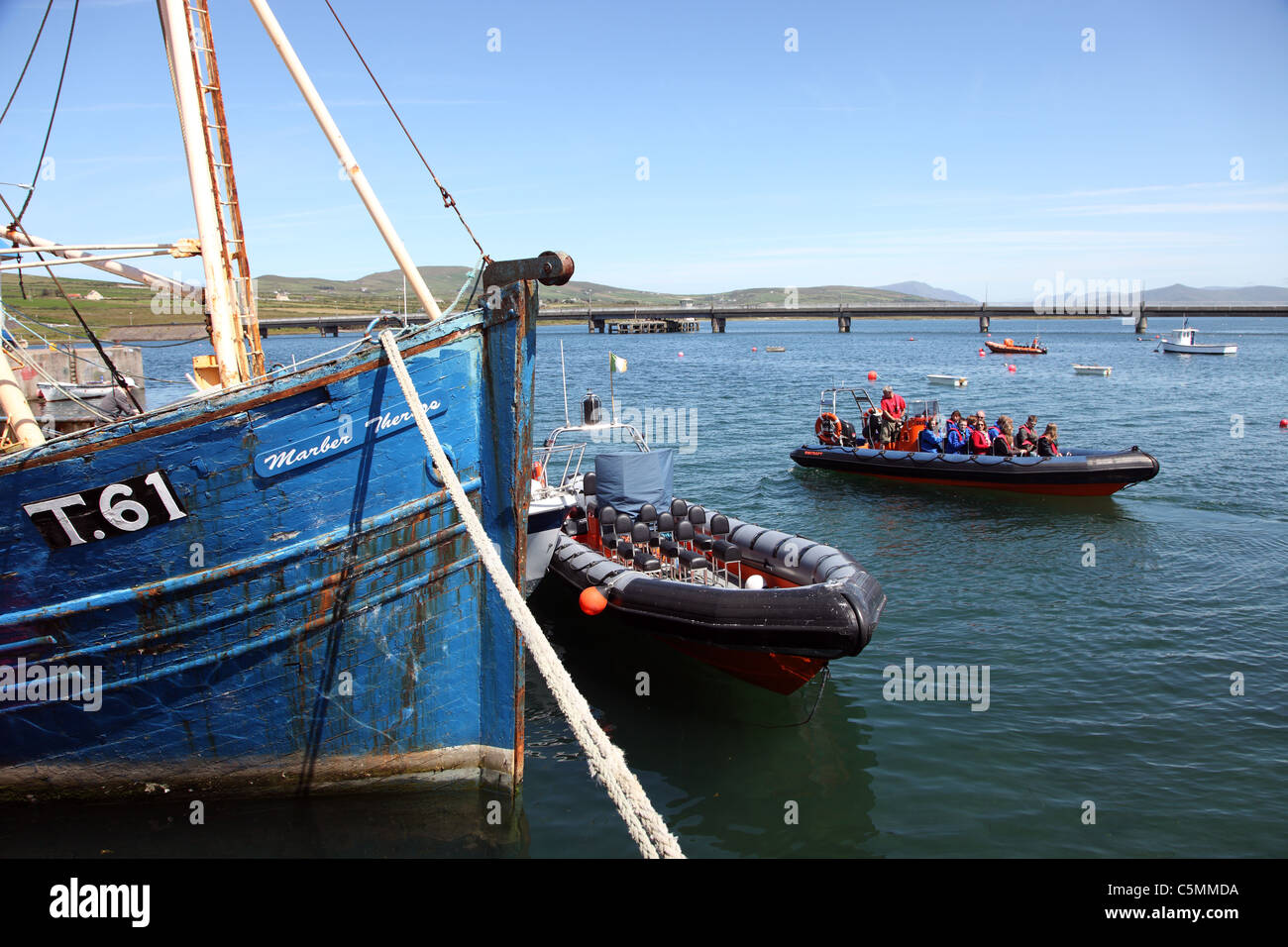 holidaymakers on sightseeing boat trip Portmagee Harbour Co Kerry Ireland Stock Photo