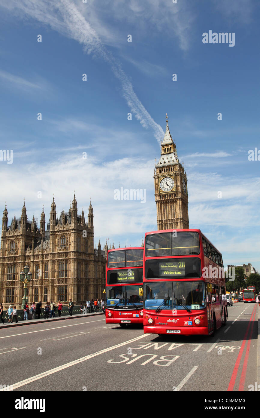 Red London buses on Westminster Bridge, Westminster, London, England, U.K. Stock Photo