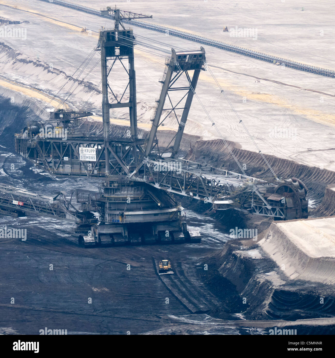 Large excavation machines working in RWE open-cast brown or lignite coal mine at Garzweiler in Northrhine Westfallia in Germany Stock Photo