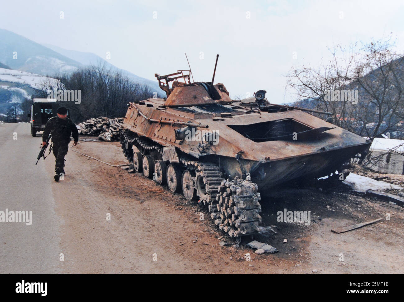 A blown up Bosnian Serb tank on the road to Mrkonjic Grad  after the civil war Photograph taken 1996 Stock Photo