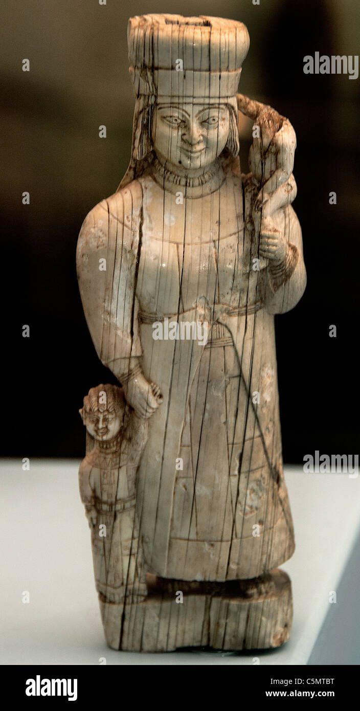 Female Goddess Kybele or Leto with two children Ivory statuette 7 - 6 th Cent BC Bayindir Elmali Turkey  Phrygian Anatolia Stock Photo