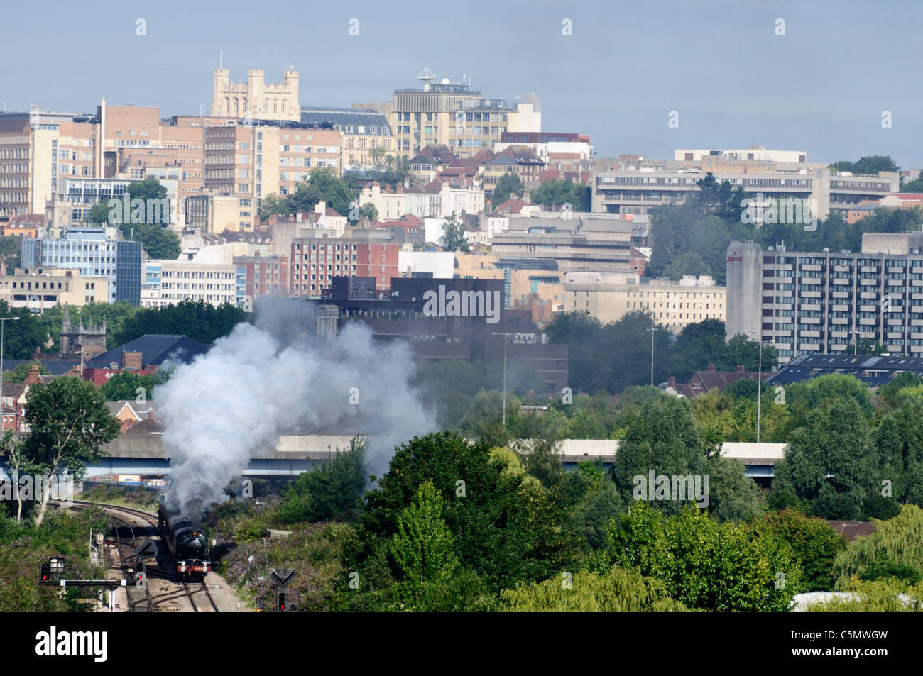 Steam Train leaving the city of Bristol in the UK Stock Photo