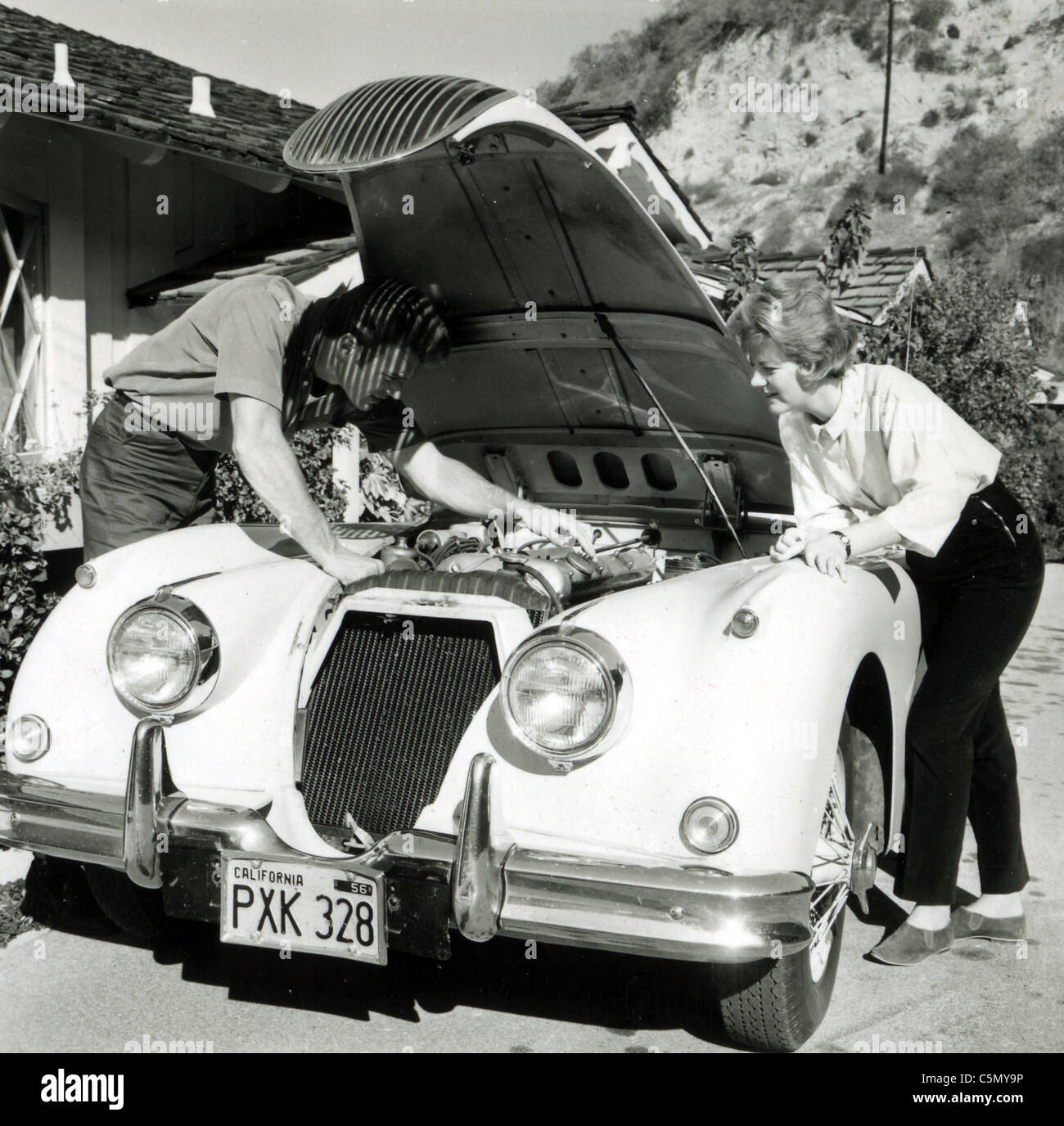 CLINT EASTWOOD with wife Maggie at their Los Angeles home about 1958. Photo Larry Barbier Jnr Stock Photo