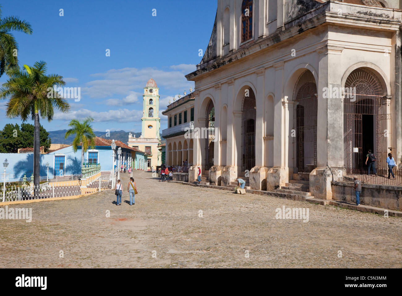 Cuba, Trinidad.  Church of the Holy Trinity.   Bell Tower of the Convent of San Francisco in the background. Stock Photo