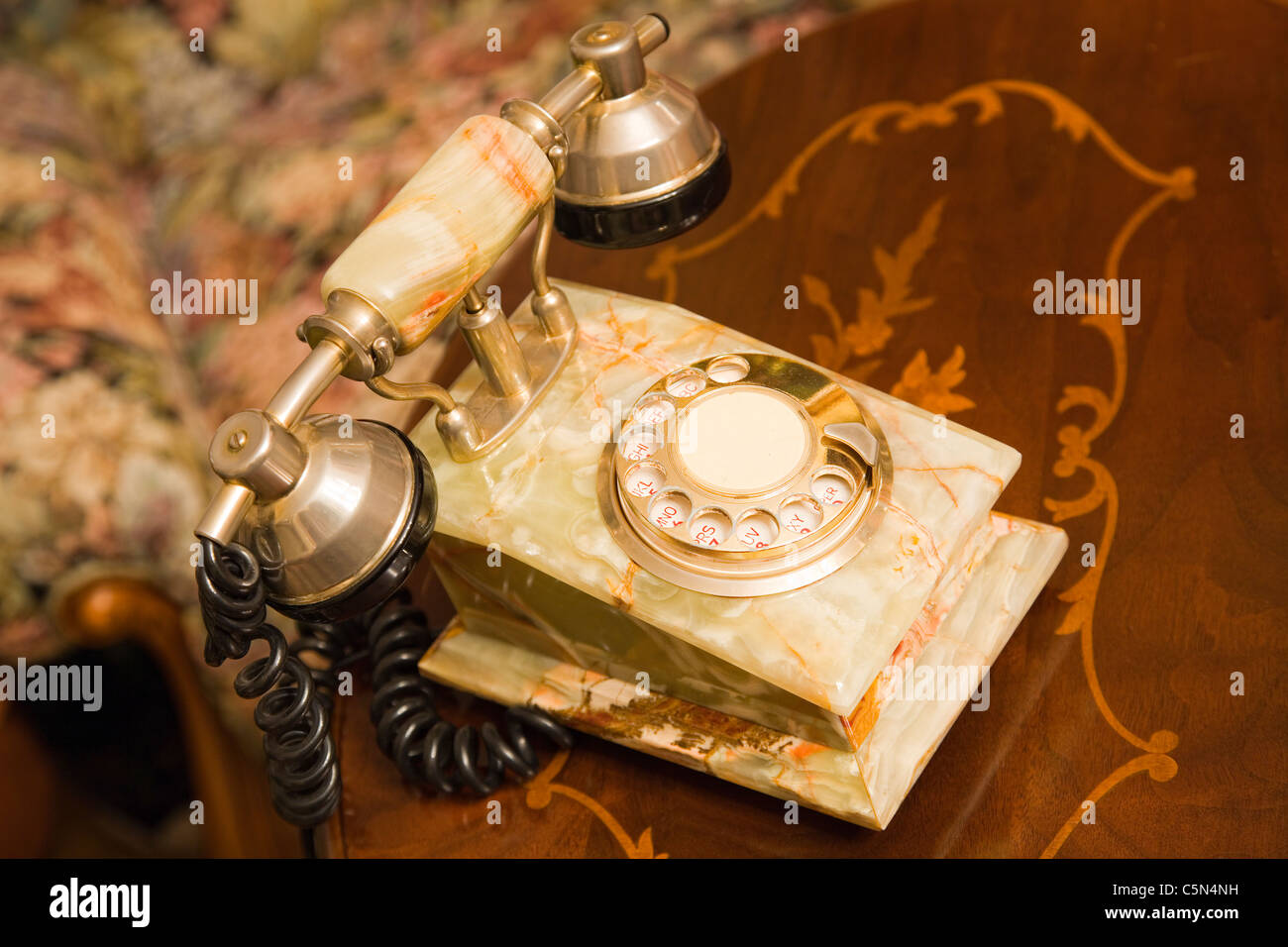 Old fashioned telephone in a house Stock Photo