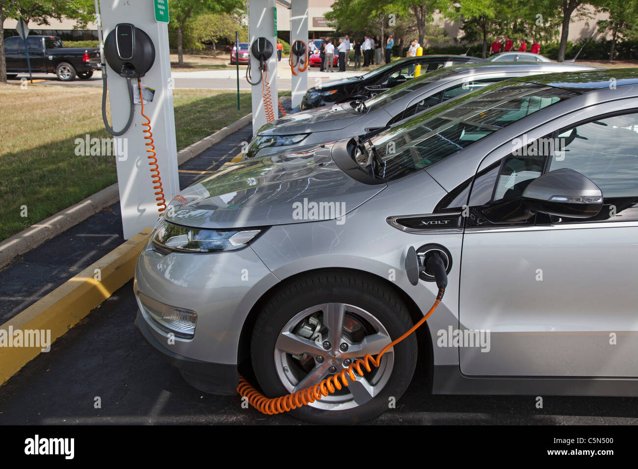Chevrolet Volt Plug-In Electric Car at Charging Station Stock Photo