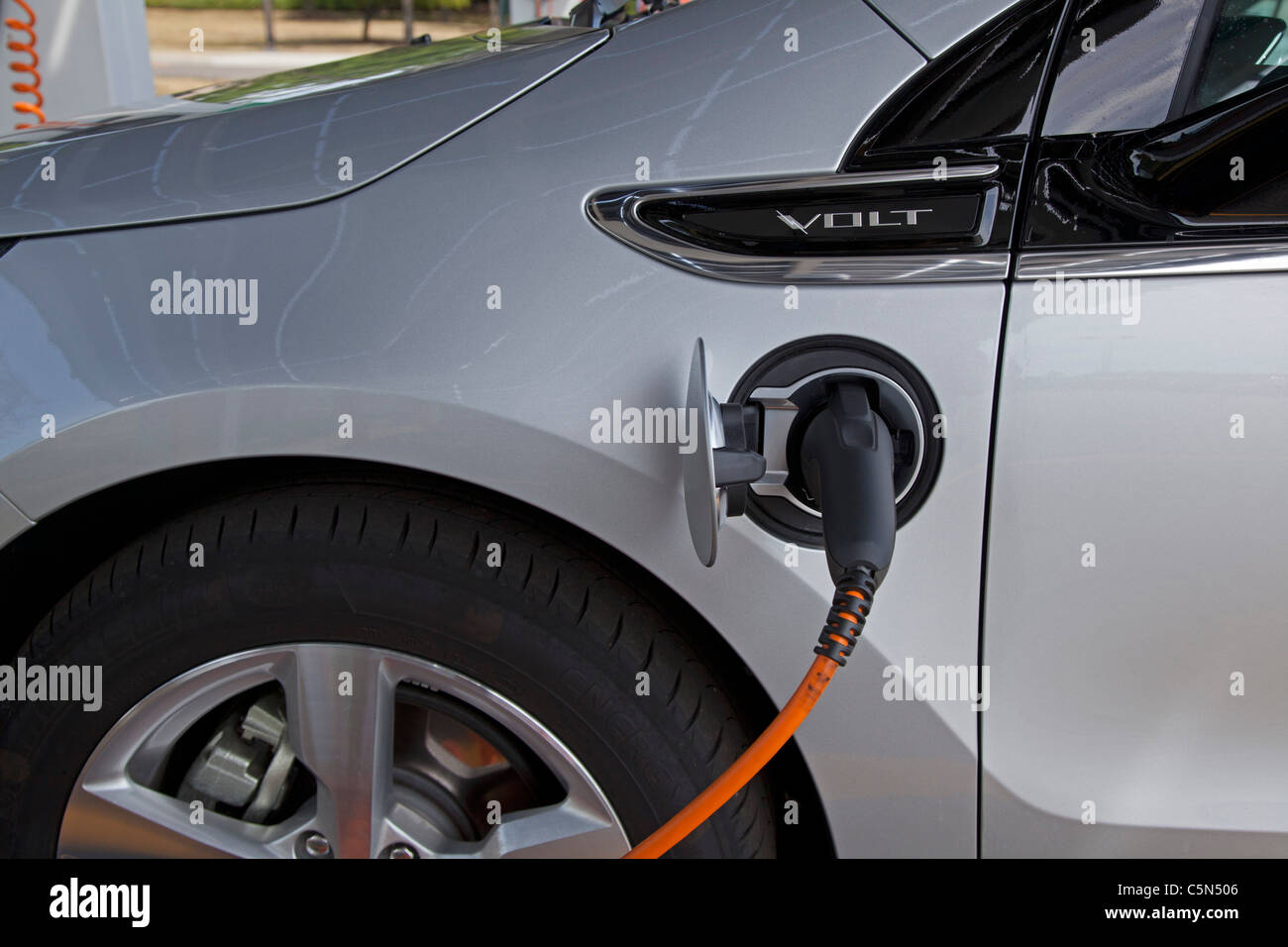 Chevrolet Volt Plug-In Electric Car at Charging Station Stock Photo