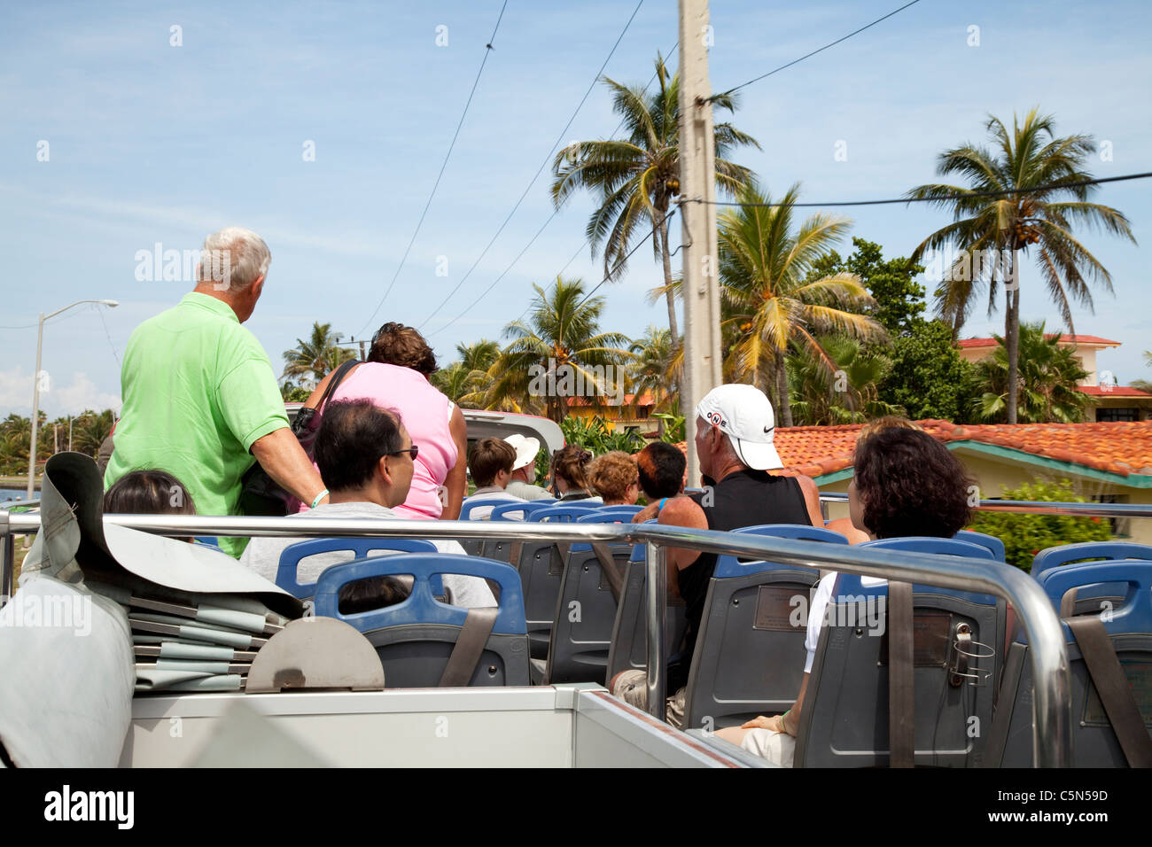 Onboard an open top tourist bus in Cuba Stock Photo