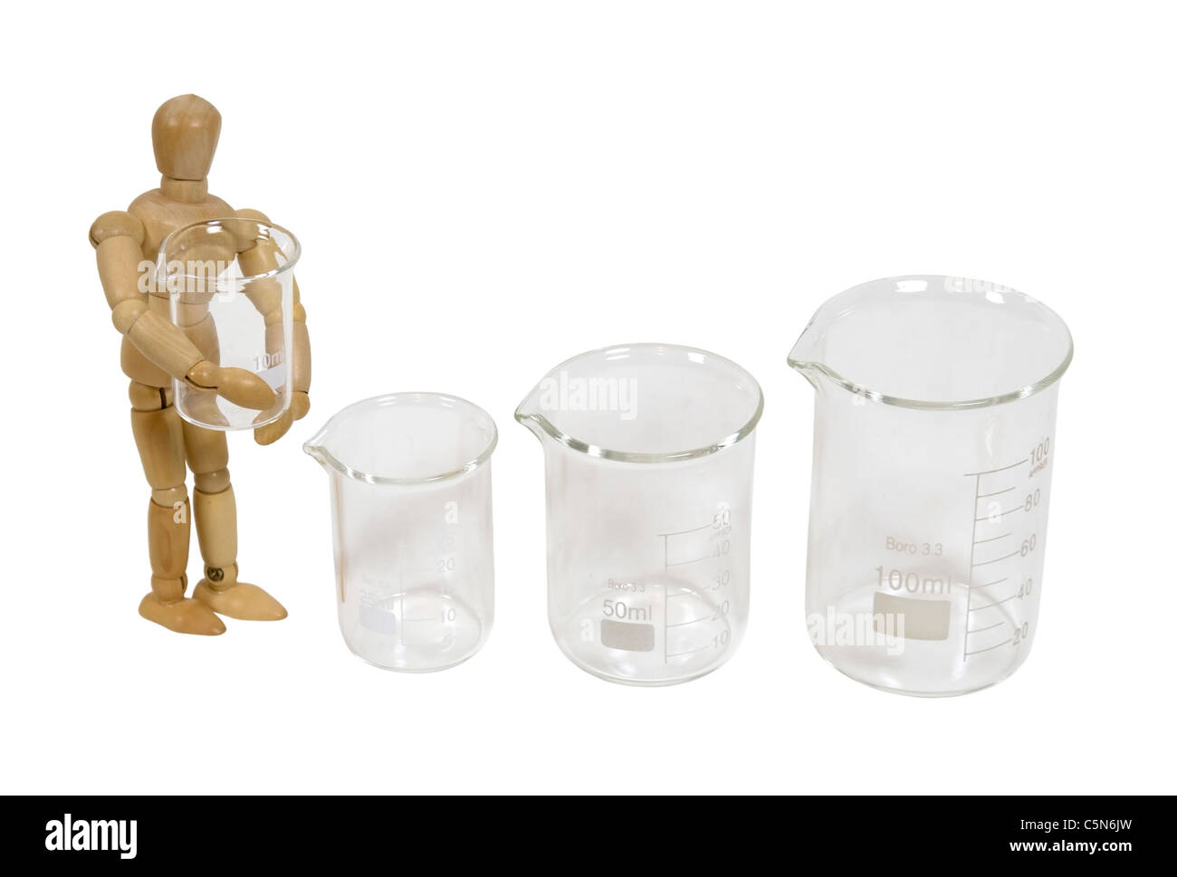 Holding a glass beaker used to measure and store liquids during