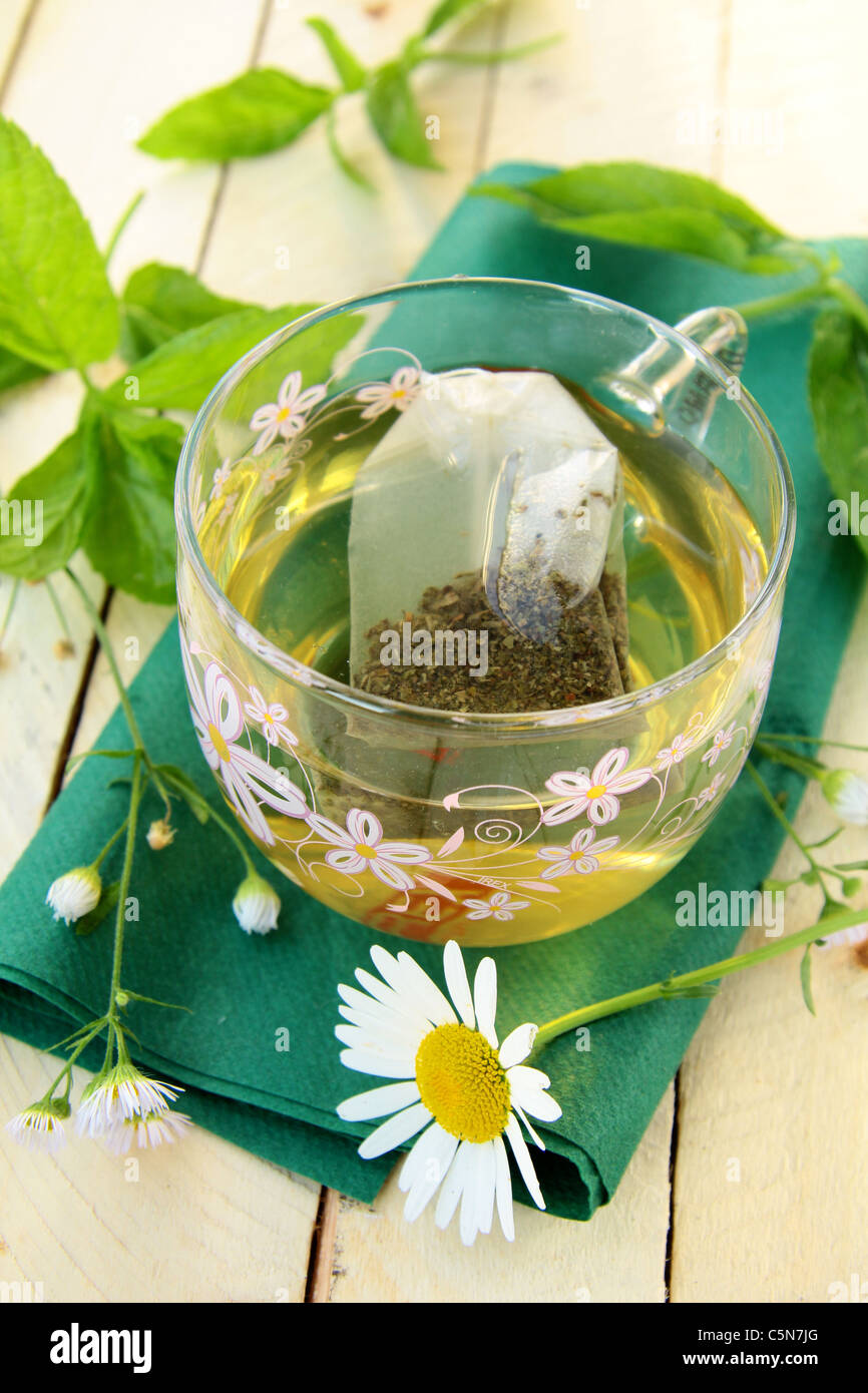 Cup of green tea with herbs, mint and chamomile Stock Photo Alamy