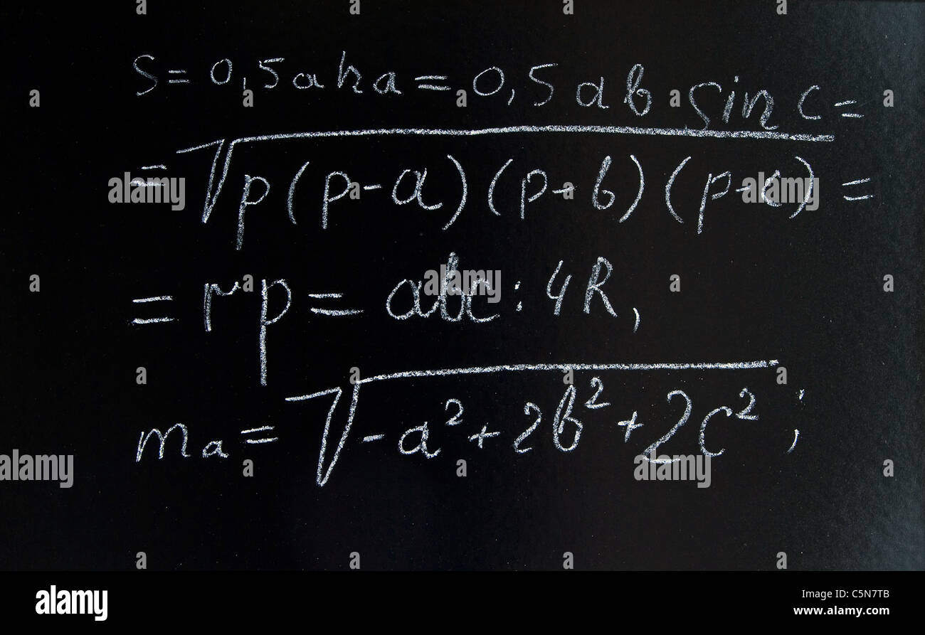 a complex formula on a blackboard Stock Photo