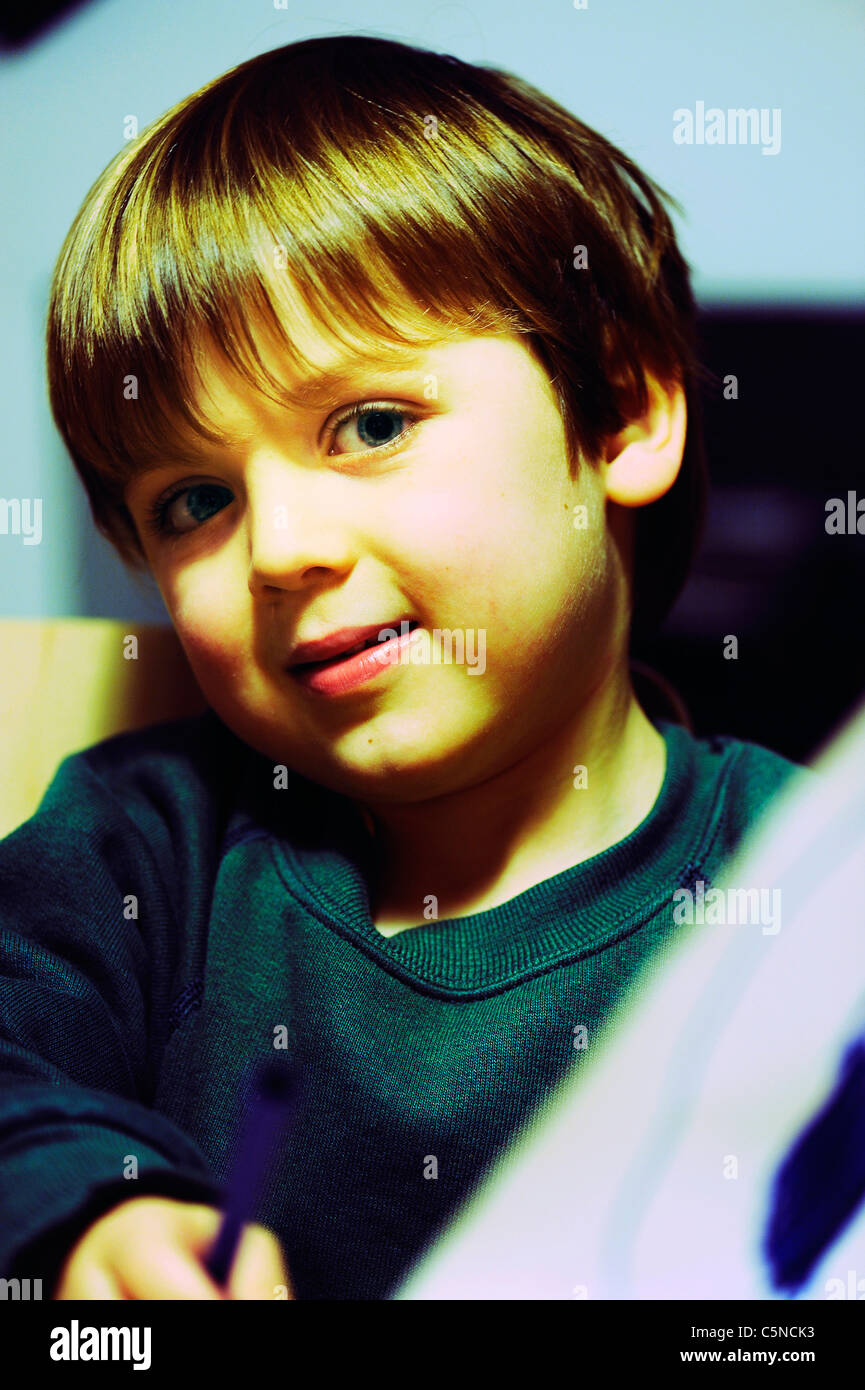 Shy boy smiling camera hi-res stock photography and images - Alamy