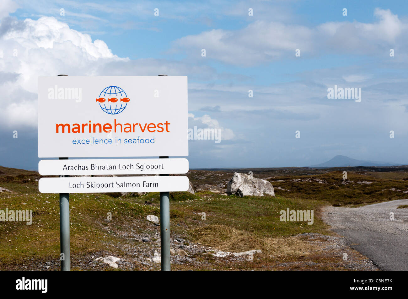 Sign at the entrance to Loch Skipport Salmon Farm owned and operated by Marine Harvest, on the Hebridean island of South Uist. Stock Photo