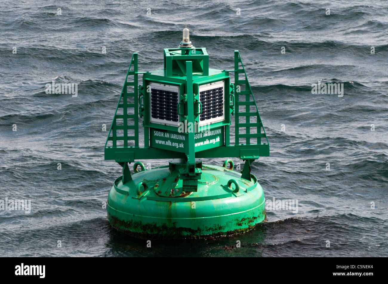 A green navigation buoy. Stock Photo