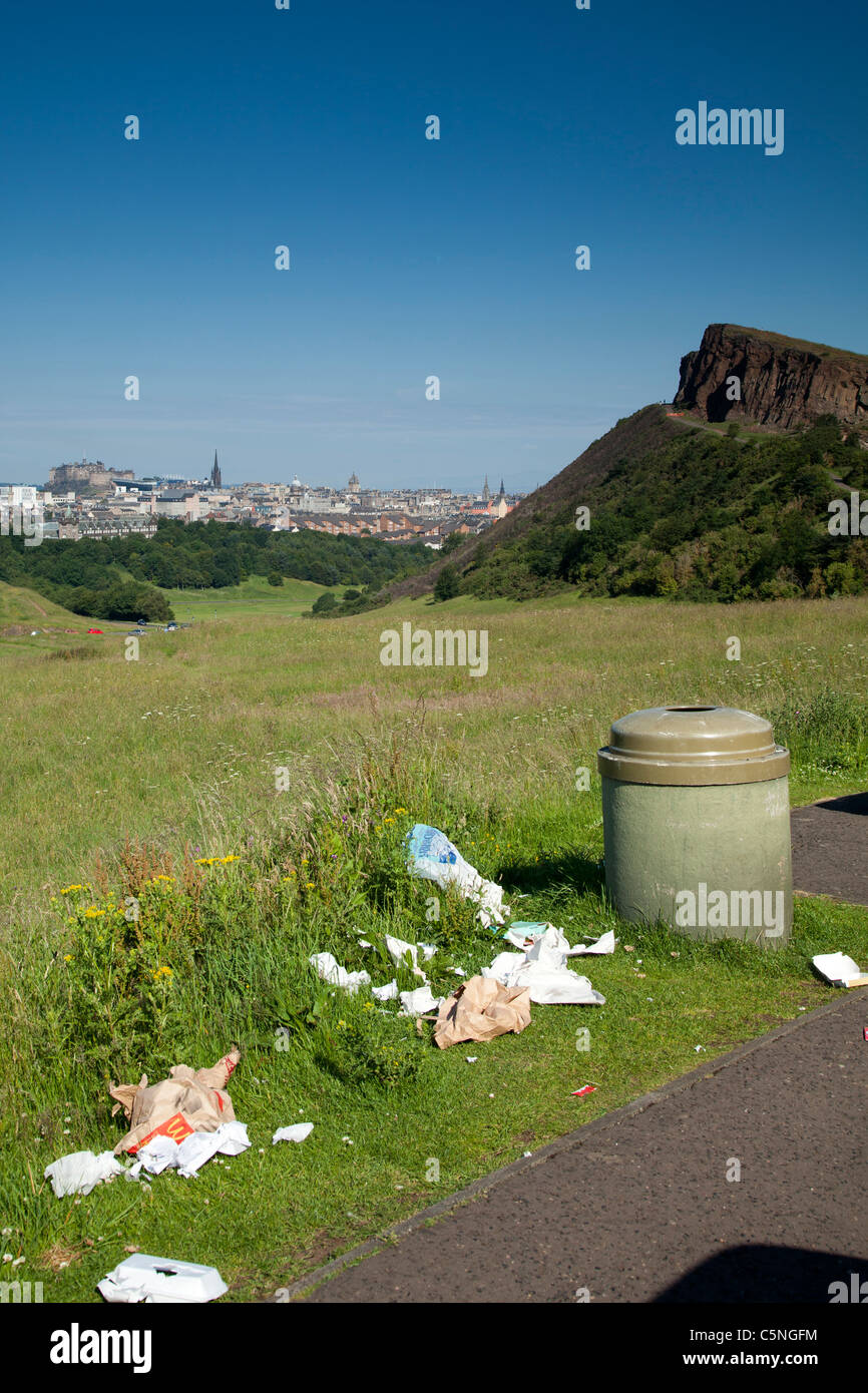 Rubbish strewn around a bin in Holyrood Park Stock Photo Alamy